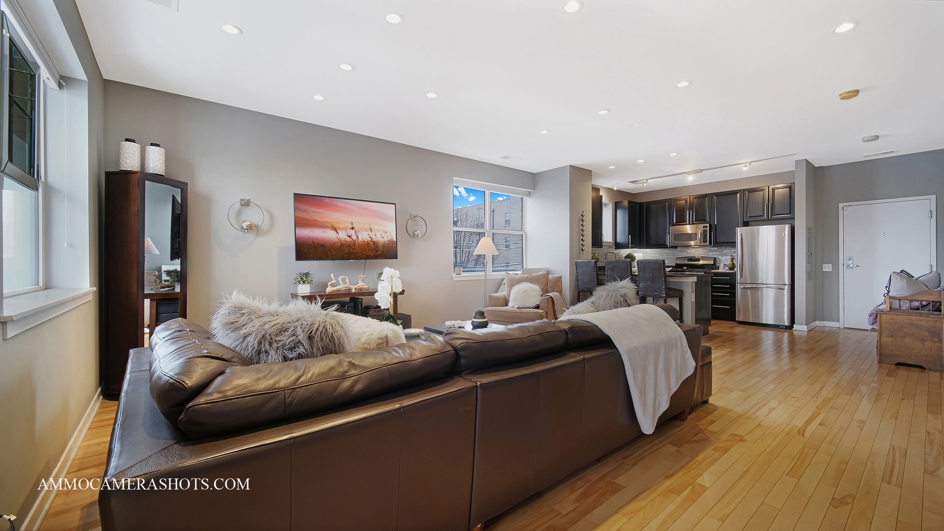 925 South Lytle Street, Unit A Chicago, IL 60607 - Photo 15 of 41 a living room with furniture and a flat screen tv