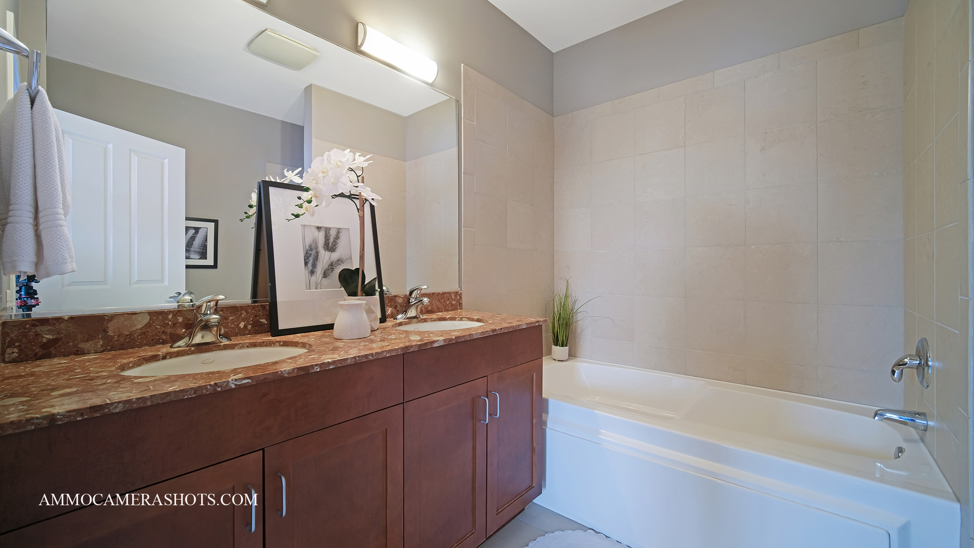 925 South Lytle Street, Unit A Chicago, IL 60607 - Photo 35 of 41 a bathroom with a granite countertop sink and a mirror