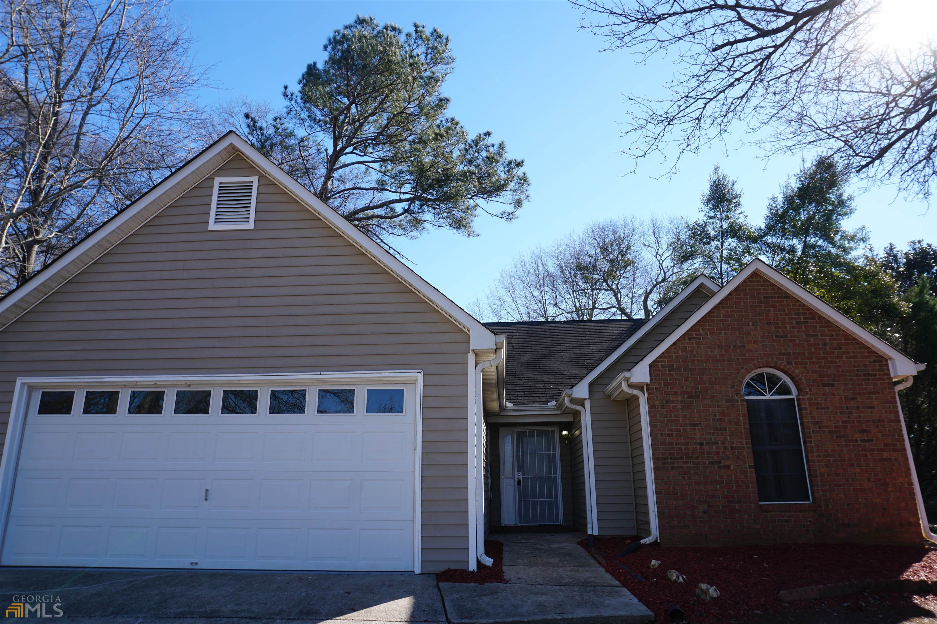 5986 Creekside Drive Rex, GA 30273 - Photo 1 of 1 a view of a house with a yard