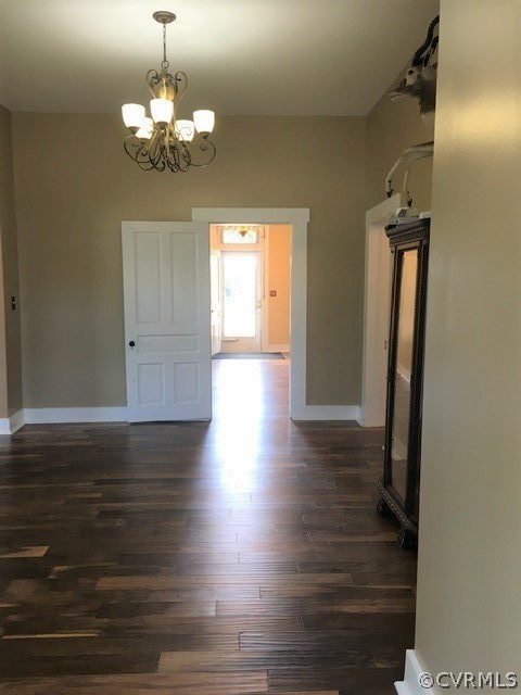 3038 Old Church Road Mechanicsville, VA 23111 - Photo 11 of 26 a view of an empty room with wooden floor and a window