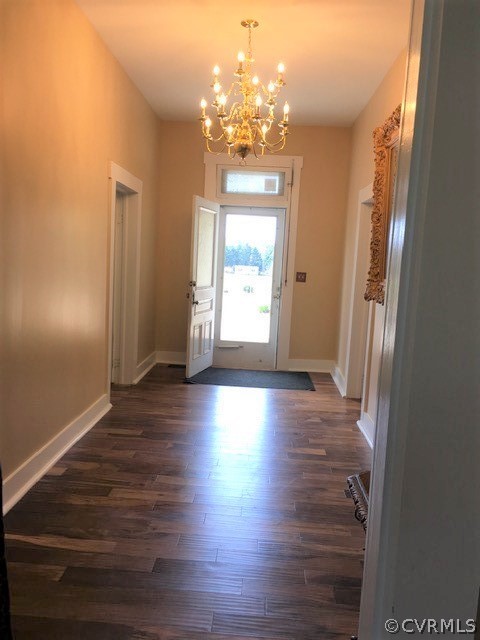 3038 Old Church Road Mechanicsville, VA 23111 - Photo 12 of 26 an empty room with wooden floor and windows