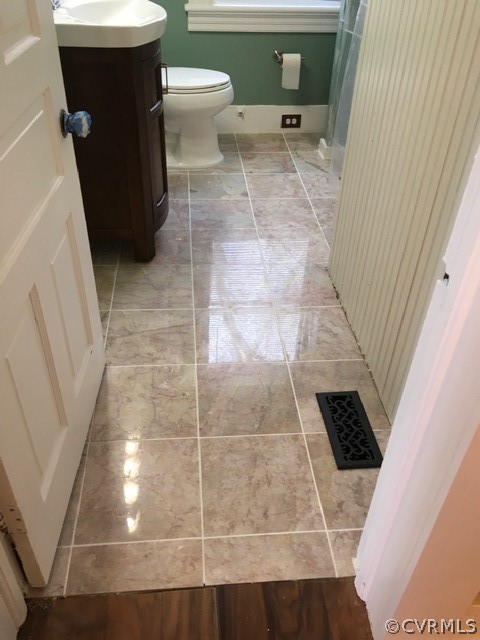 3038 Old Church Road Mechanicsville, VA 23111 - Photo 13 of 26 a bathroom with a sink and a toilet