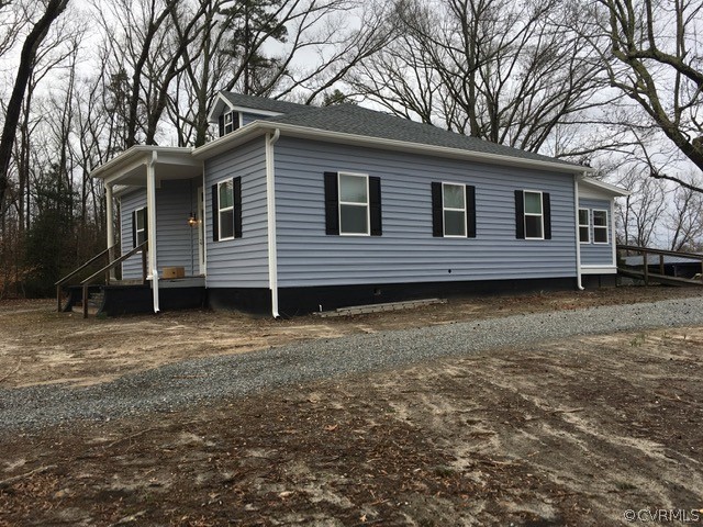 3038 Old Church Road Mechanicsville, VA 23111 - Photo 24 of 26 a view of a house with a yard