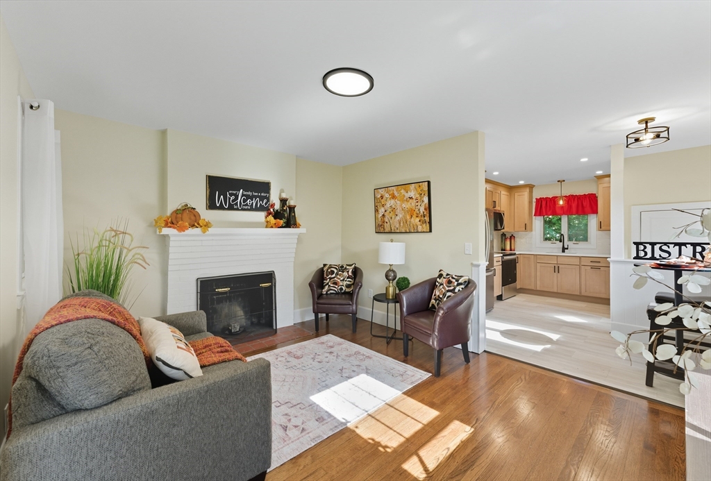 636 Amostown Road West Springfield, MA 01089 - Photo 11 of 40 a living room with furniture and a fireplace