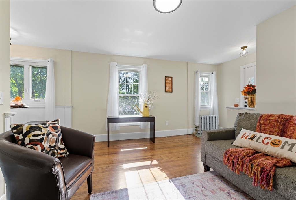 636 Amostown Road West Springfield, MA 01089 - Photo 15 of 40 a living room with furniture and a window