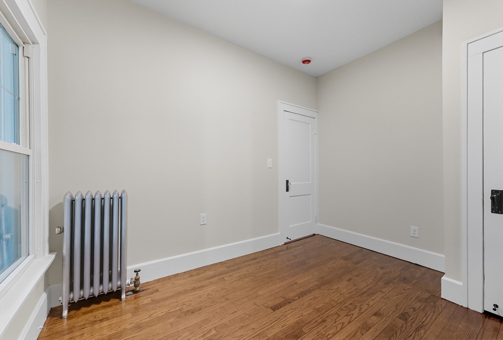 636 Amostown Road West Springfield, MA 01089 - Photo 24 of 40 a view of a hallway with wooden floor