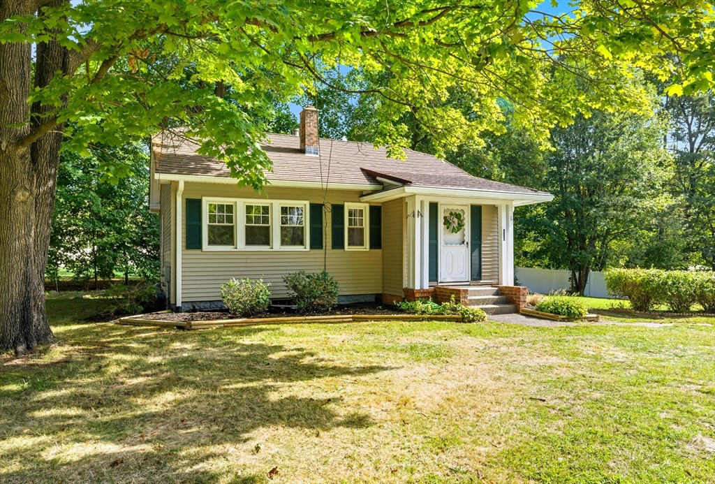 636 Amostown Road West Springfield, MA 01089 - Photo 31 of 40 a front view of a house with a yard