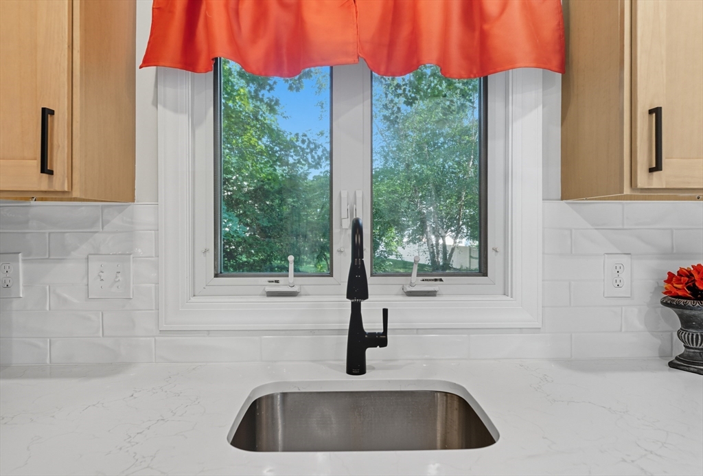 636 Amostown Road West Springfield, MA 01089 - Photo 4 of 40 a kitchen with a sink and large window
