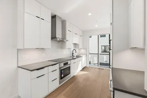 a fireplace with a hallway
