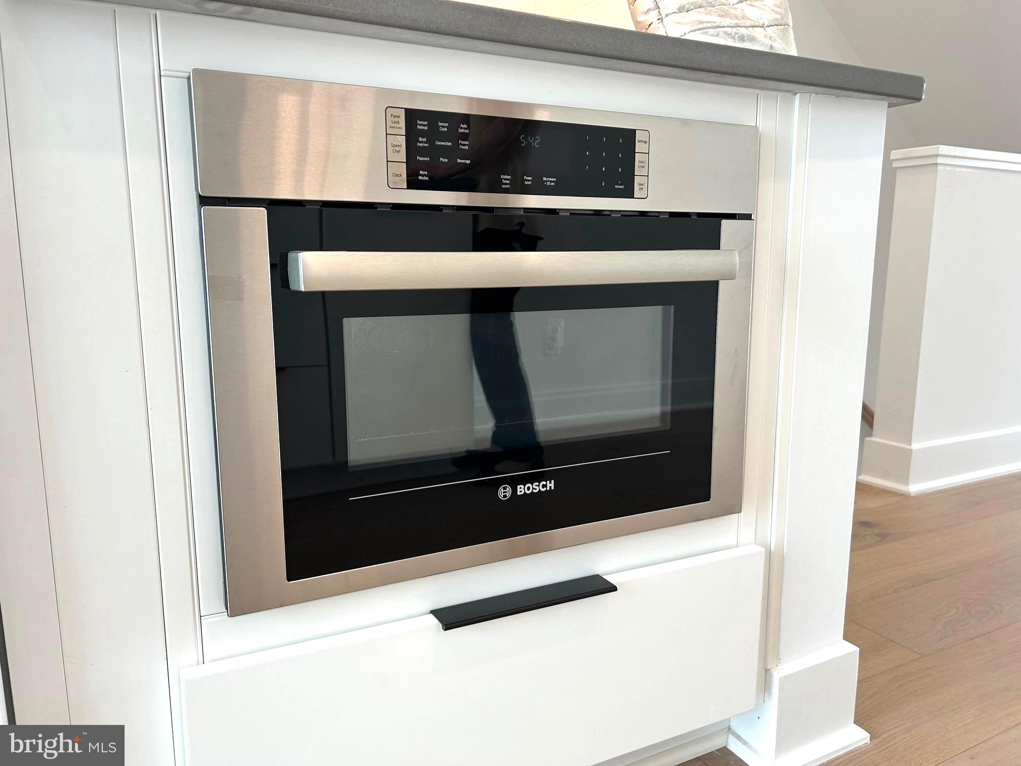 2607 First Street Northwest Washington, DC 20001 - Photo 34 of 53 Sleek Bosch oven in modern kitchen.
