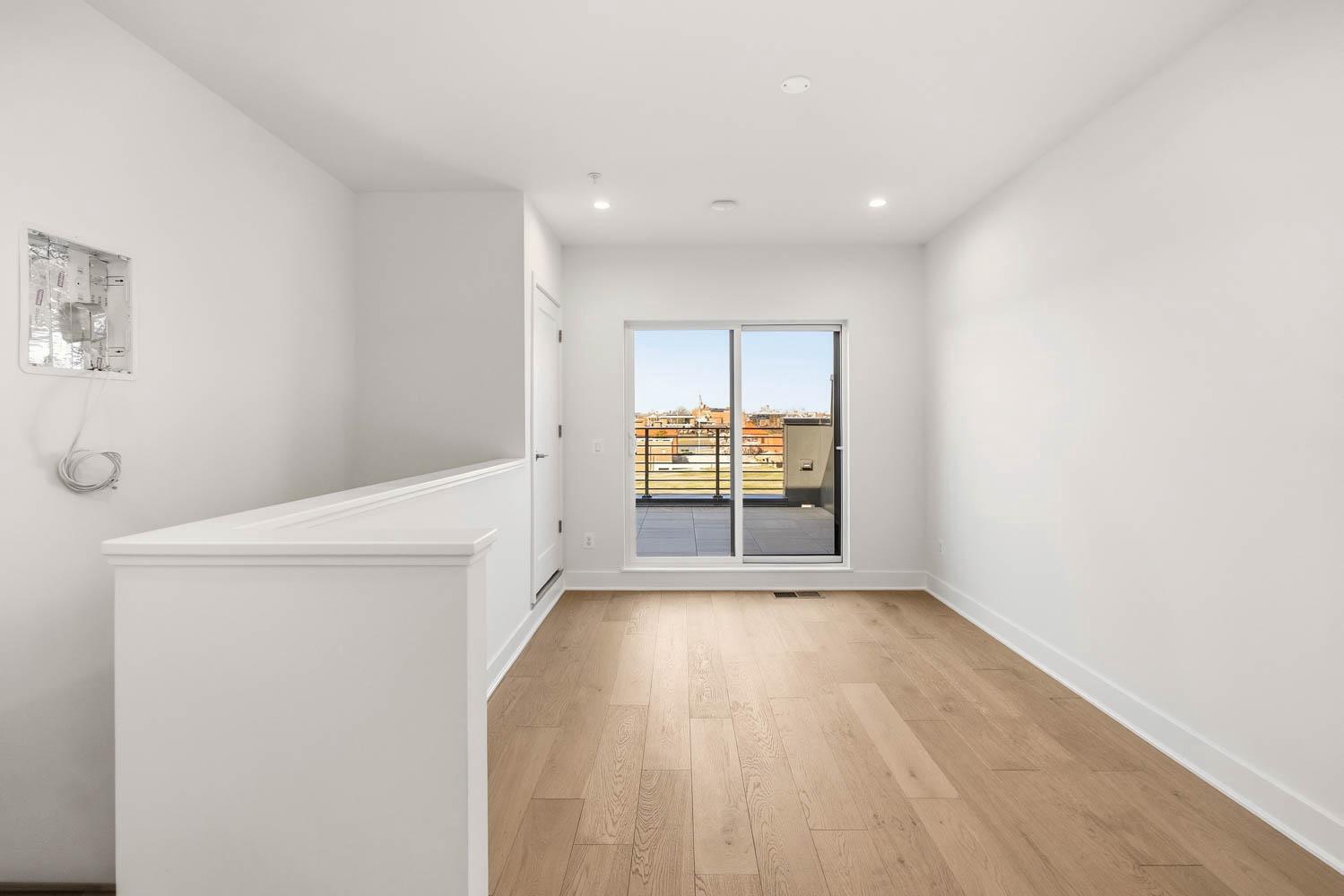 2607 First Street Northwest Washington, DC 20001 - Photo 10 of 53 Primary suite with city views and rooftop