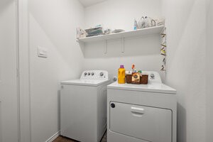 549 Arnold Loop, Unit A Kyle, TX 78640 - Photo 19 of 31 a utility room with dryer and washer