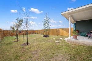 549 Arnold Loop, Unit A Kyle, TX 78640 - Photo 23 of 31 a view of a yard
