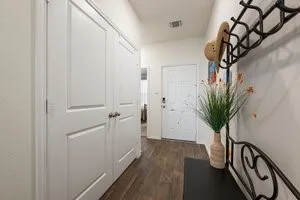 a view of a entryway with wooden floor