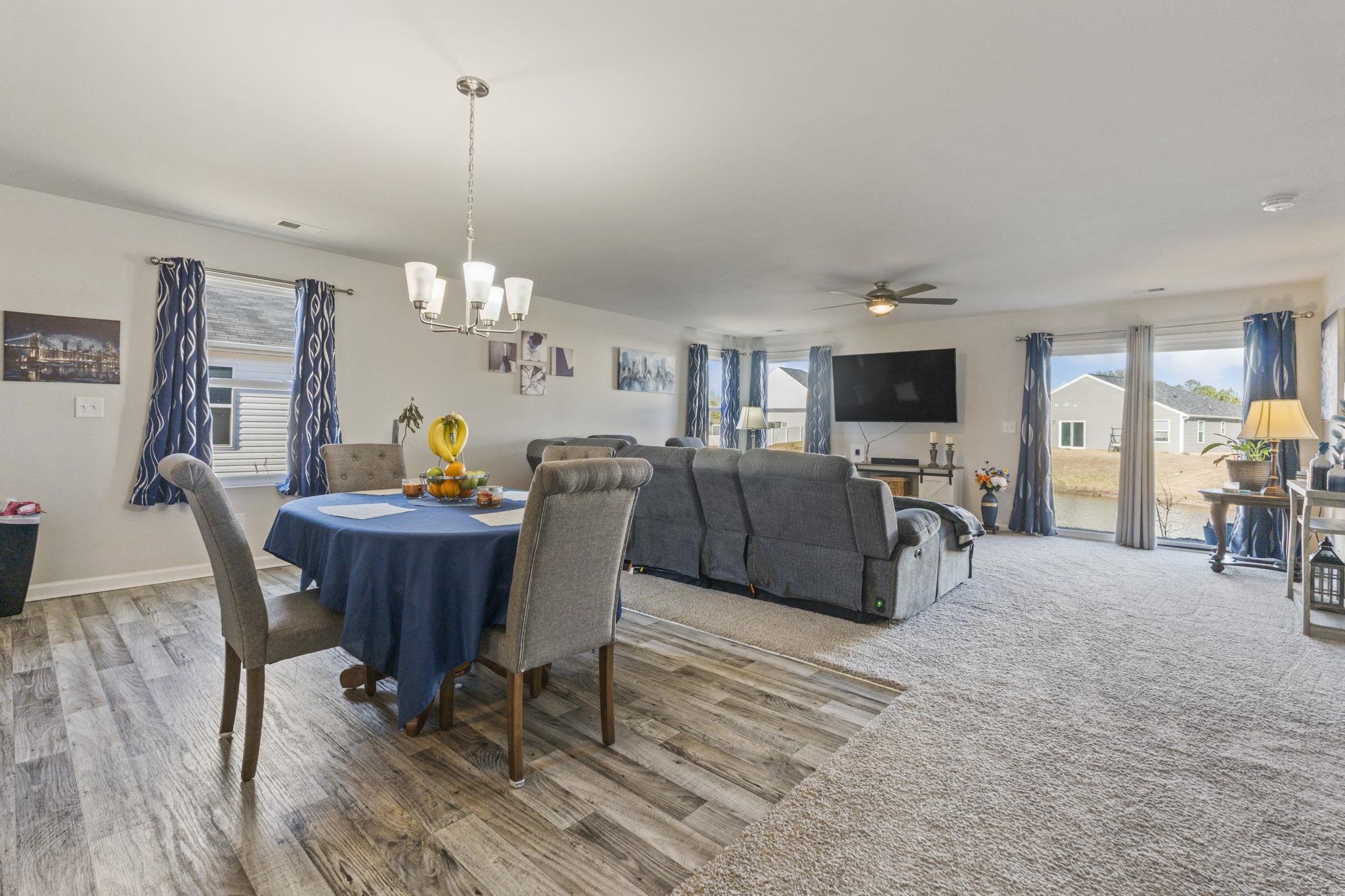 520 Dundalk Drive Conway, SC 29526 - Photo 13 of 35 Dining area featuring healthy amount of natural light, a chandelier, and light wood-type flooring