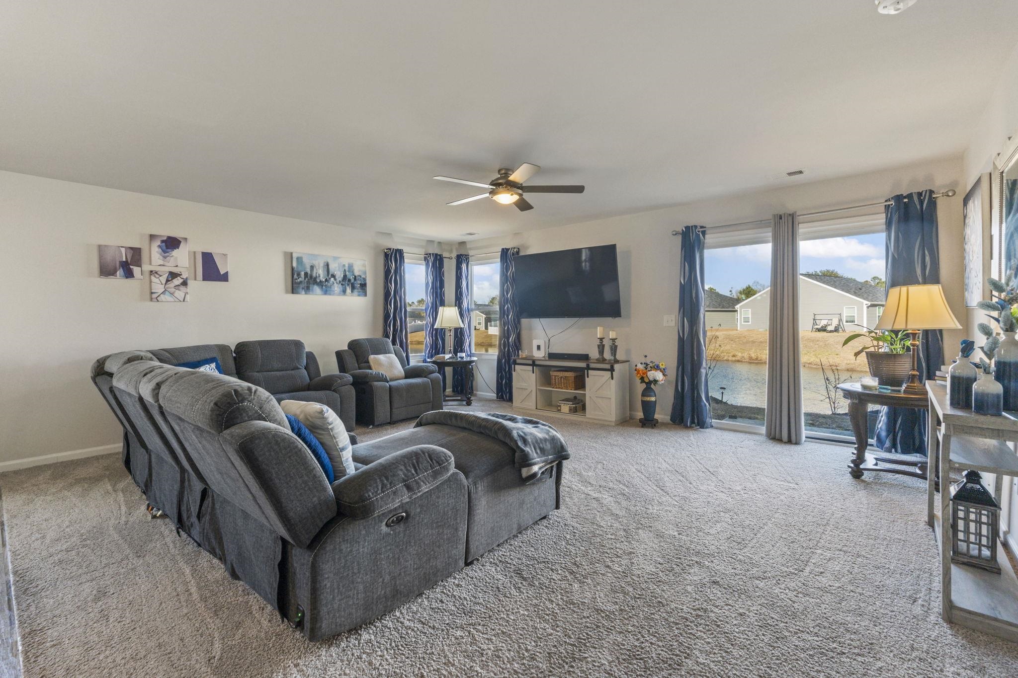 520 Dundalk Drive Conway, SC 29526 - Photo 14 of 35 Living room featuring carpet flooring and ceiling fan