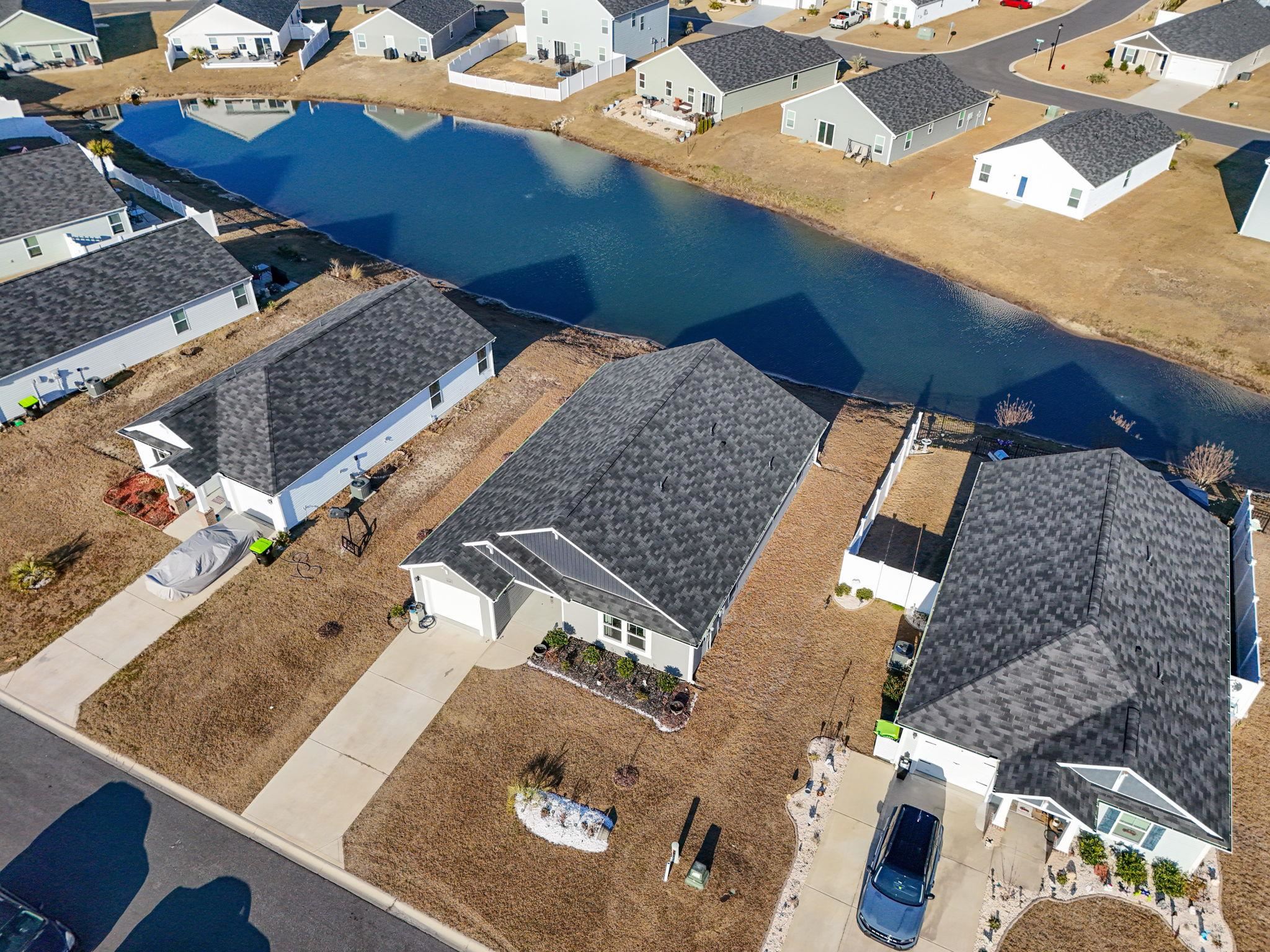 520 Dundalk Drive Conway, SC 29526 - Photo 2 of 35 Aerial perspective of suburban area featuring a nearby body of water