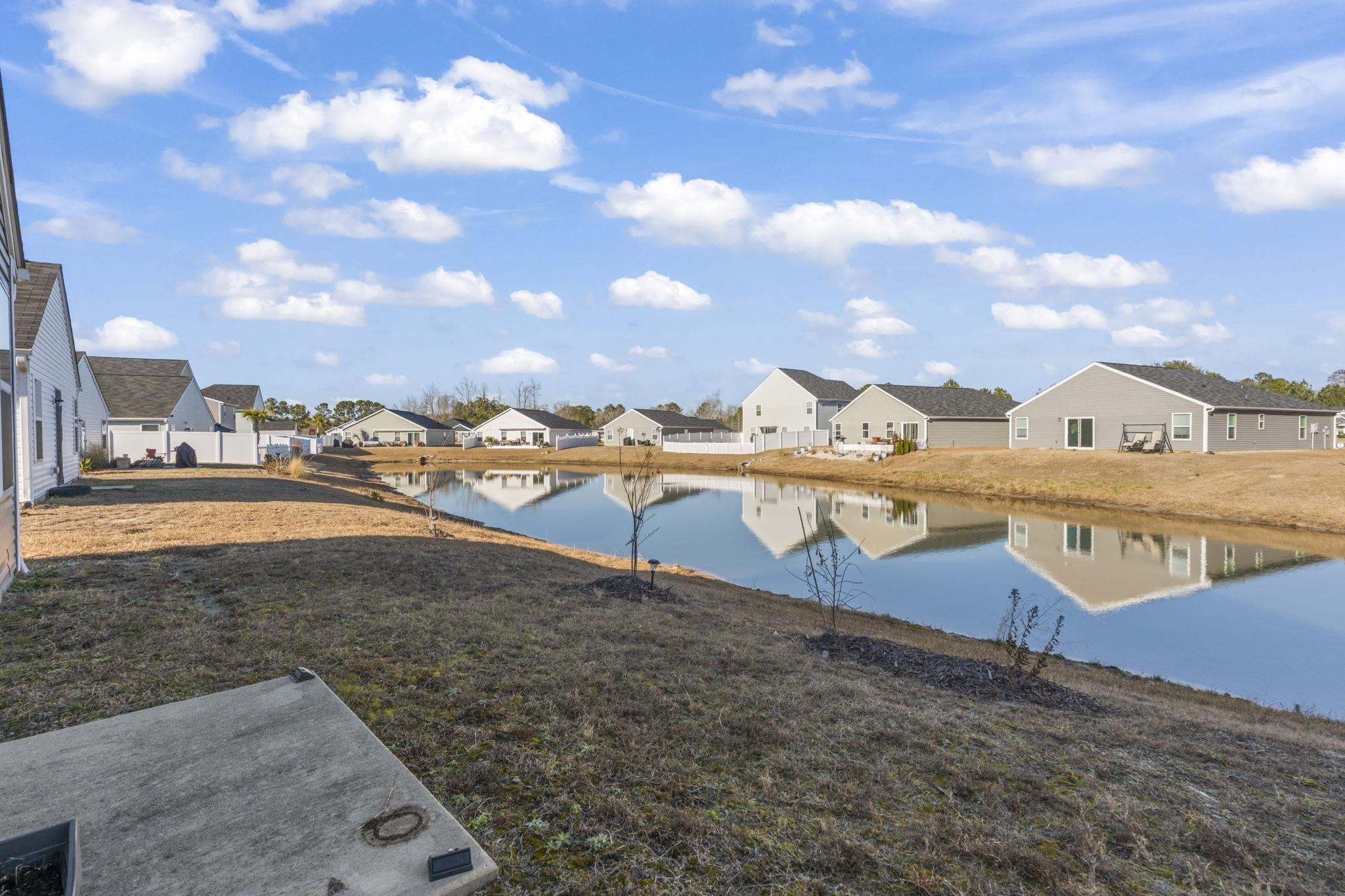 520 Dundalk Drive Conway, SC 29526 - Photo 28 of 35 View of green lawn with a water view and a residential view
