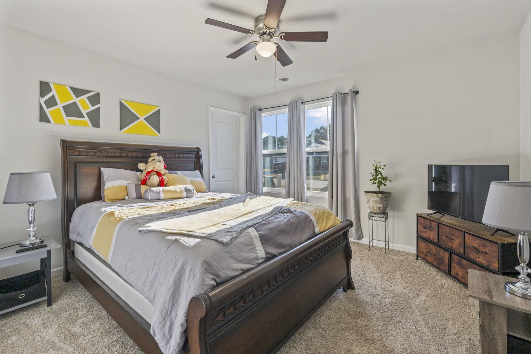 520 Dundalk Drive Conway, SC 29526 - Photo 6 of 35 Bedroom with light colored carpet and ceiling fan