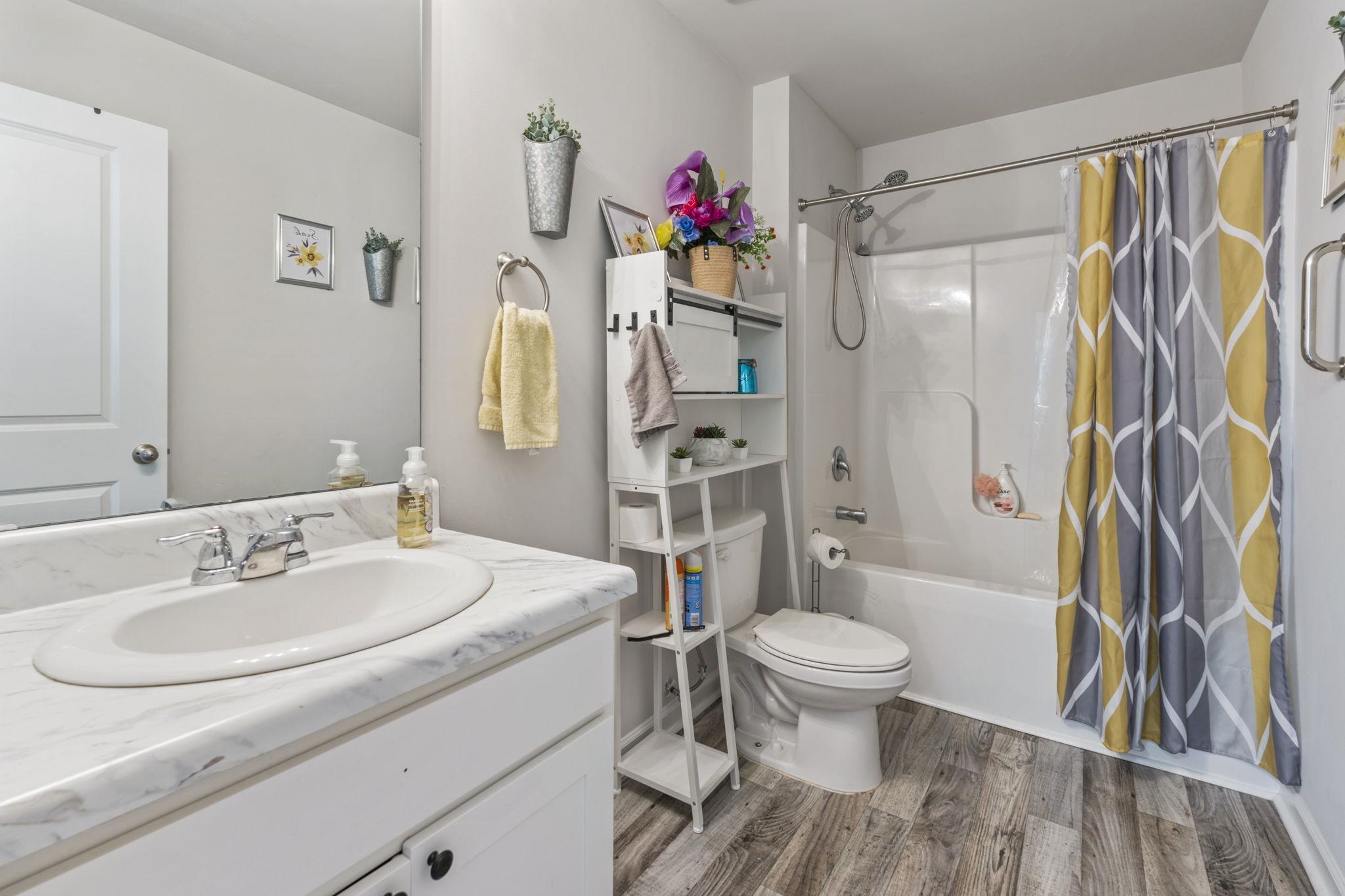 520 Dundalk Drive Conway, SC 29526 - Photo 7 of 35 Full bathroom featuring vanity, shower / tub combo, and dark wood-style floors