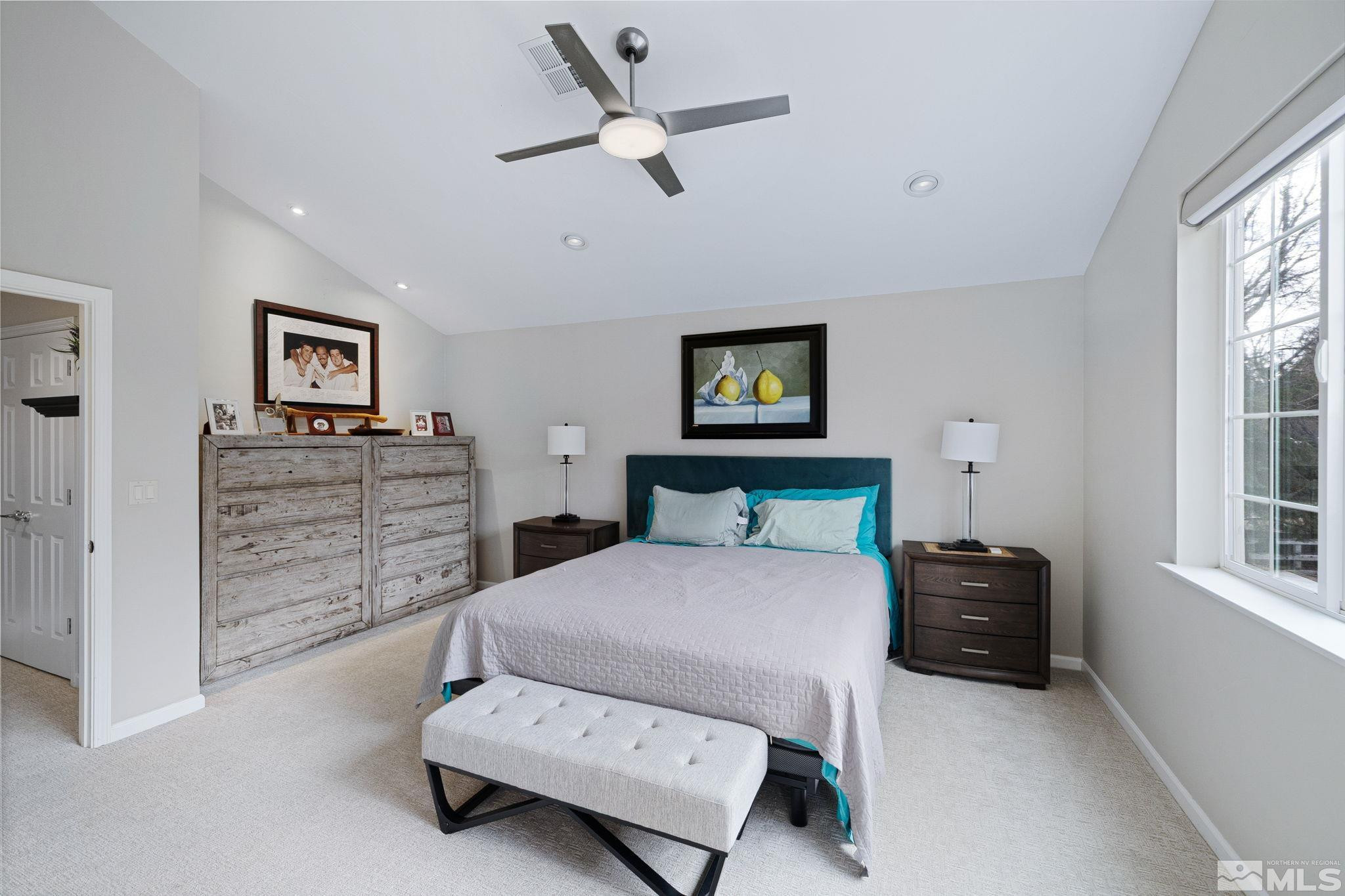 1075 Country Estates Circle Reno, NV 89511 - Photo 28 of 40 a bedroom with a bed and a cabinets