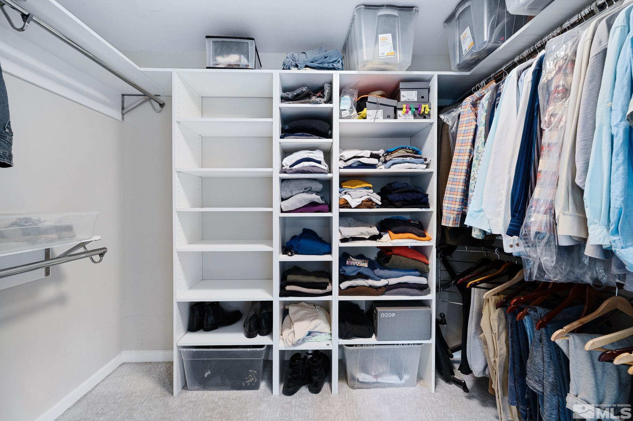 1075 Country Estates Circle Reno, NV 89511 - Photo 33 of 40 a view of walk in closet with clothes and shoes