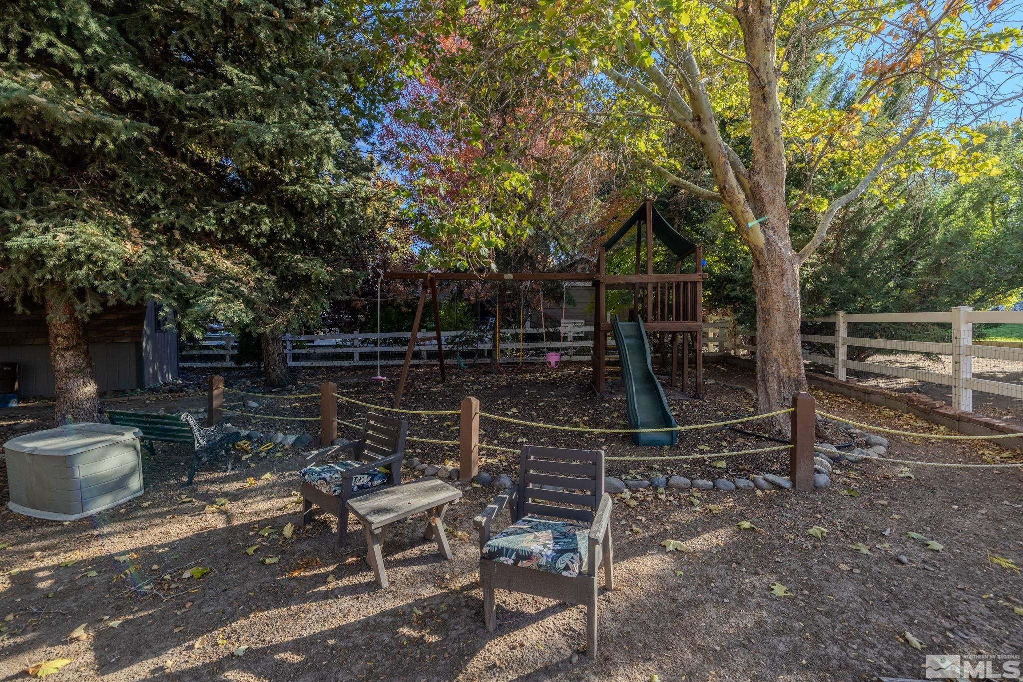 1075 Country Estates Circle Reno, NV 89511 - Photo 36 of 40 a view of backyard with trampoline