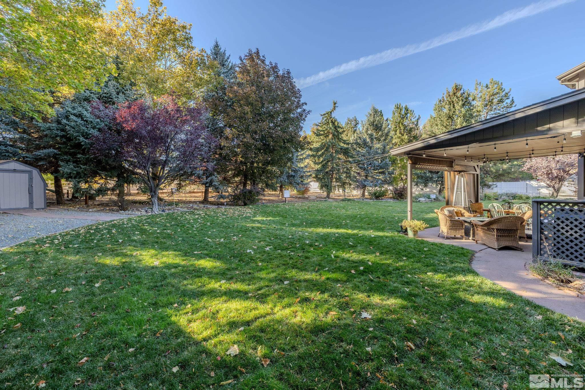 1075 Country Estates Circle Reno, NV 89511 - Photo 38 of 40 a view of a house with backyard and sitting area