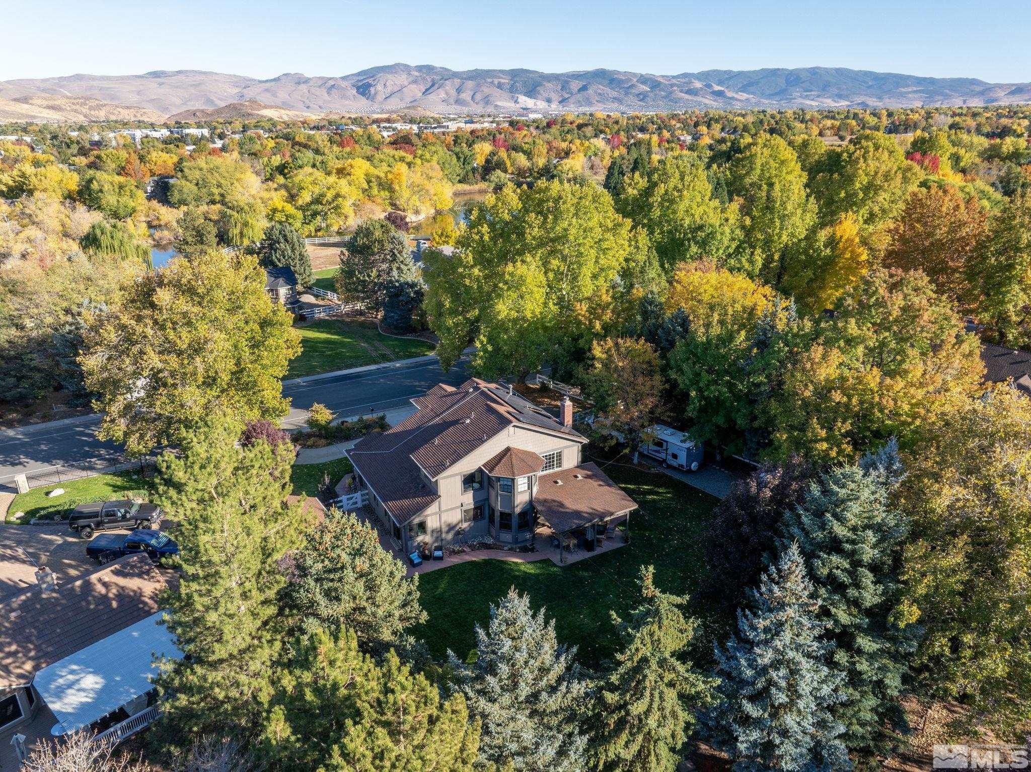 1075 Country Estates Circle Reno, NV 89511 - Photo 40 of 40 an aerial view of residential house with outdoor space and trees all around