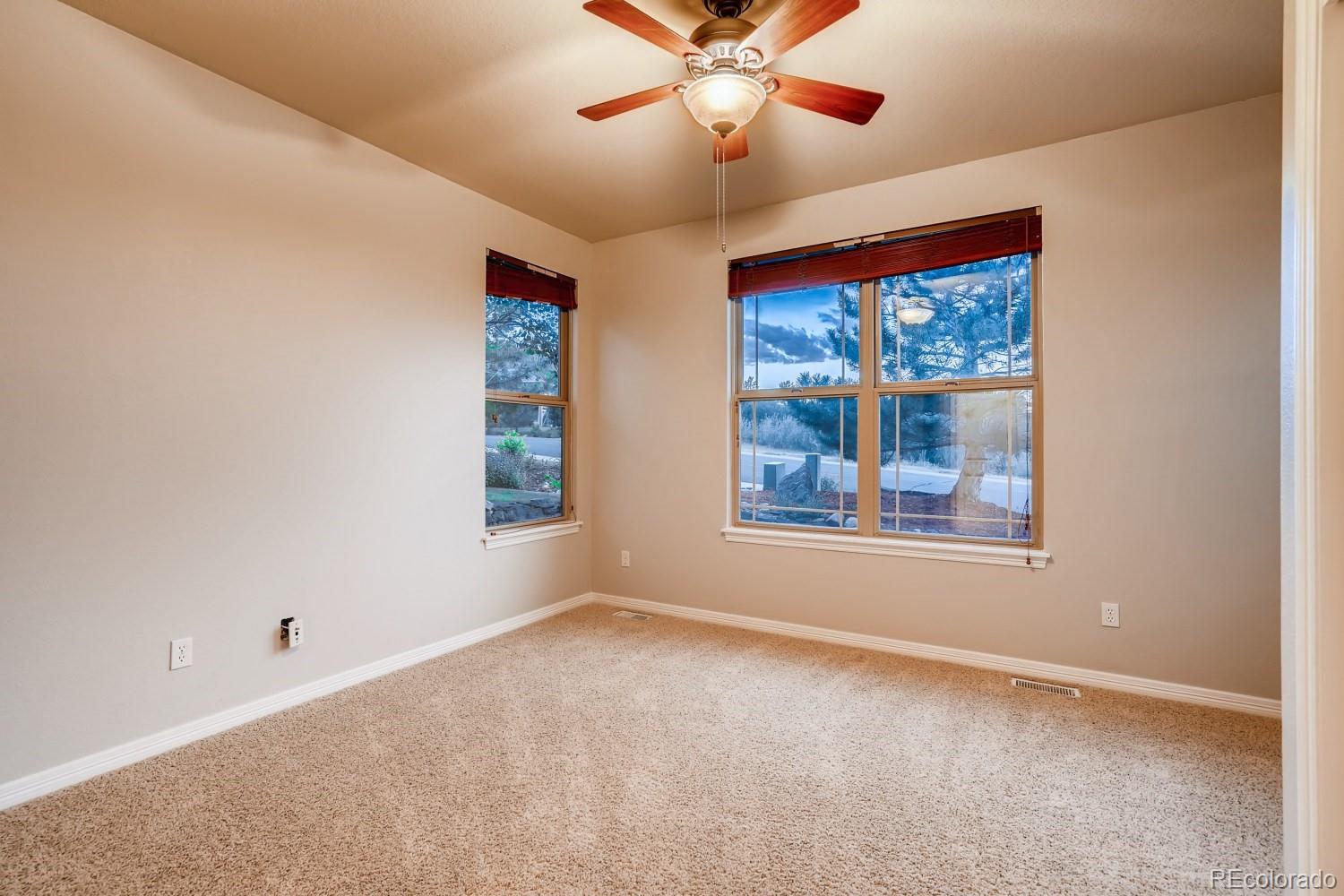 1644 Ridge Trail Lane Castle Rock, CO 80104 - Photo 18 of 38 a view of an empty room with a window