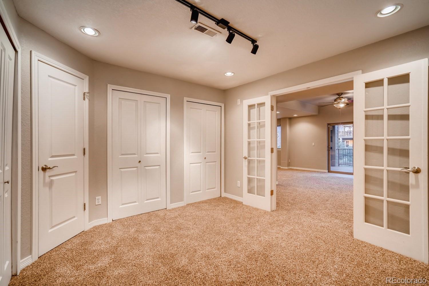 1644 Ridge Trail Lane Castle Rock, CO 80104 - Photo 33 of 38 a view of empty room with wooden floor and entryway