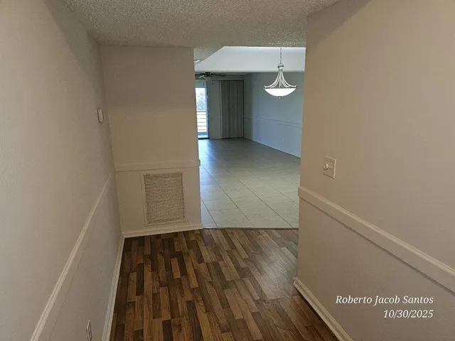 a very nice looking room with a chandelier