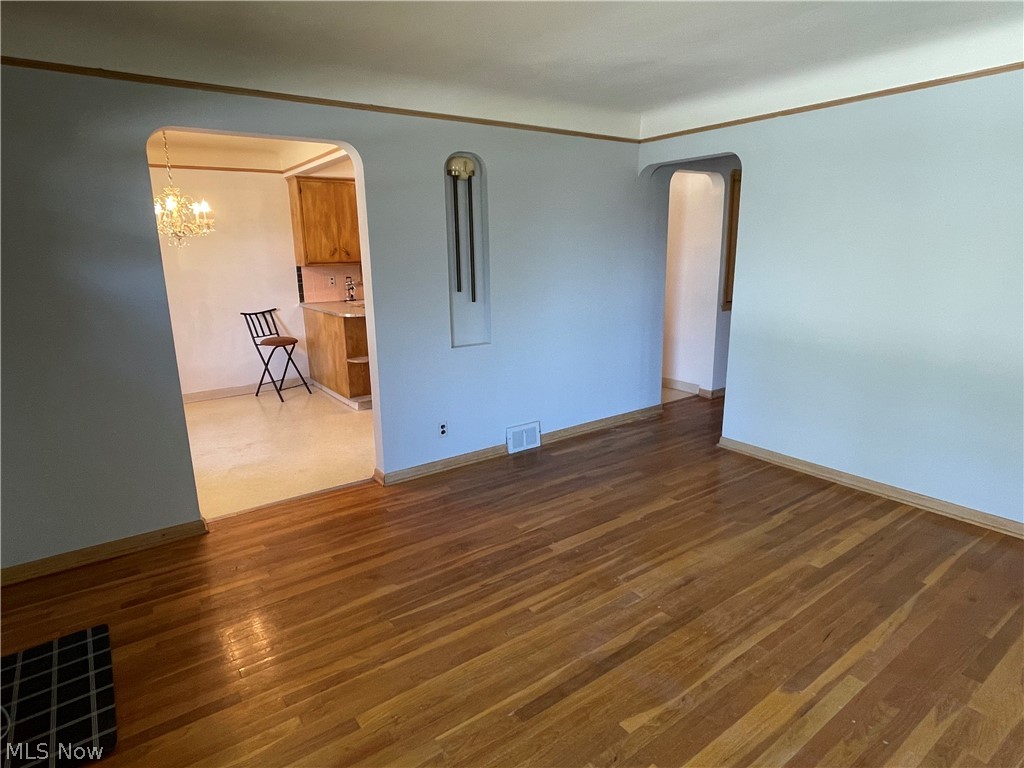 24800 Emery Road Warrensville Heights, OH 44128 - Photo 5 of 17 Looking into eat-in-kitchen and hallway to bedrooms & bathroom from the front entrance