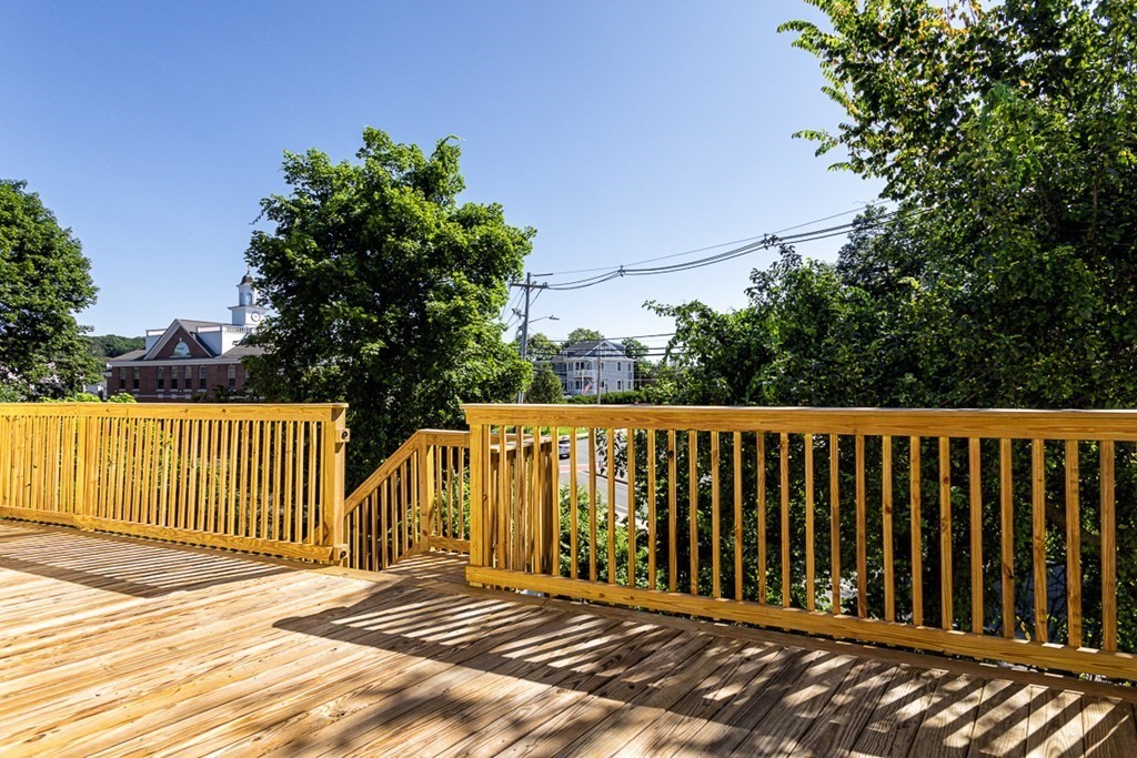 2 Farragut Road, Unit 5 Ipswich, MA 01938 - Photo 14 of 15 a view of a wooden fence