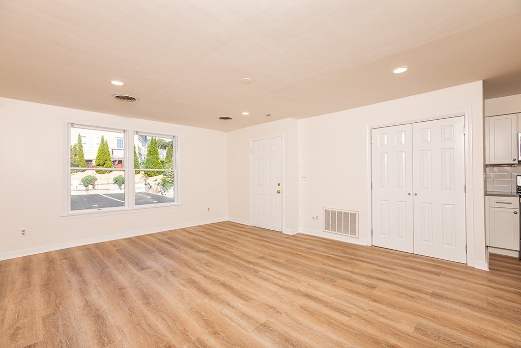 2 Farragut Road, Unit 5 Ipswich, MA 01938 - Photo 6 of 15 a view of an empty room with a window