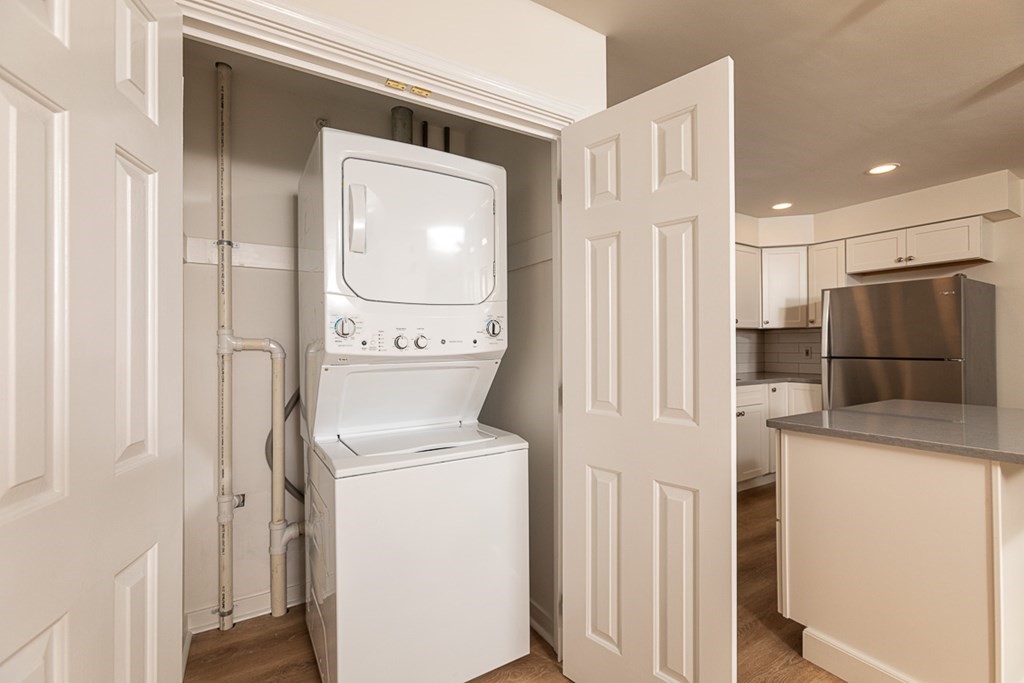 2 Farragut Road, Unit 5 Ipswich, MA 01938 - Photo 7 of 15 a kitchen with a refrigerator a washer and dryer
