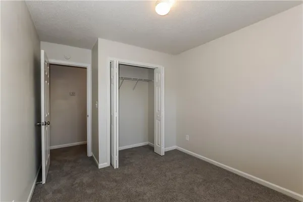 an empty room with closet