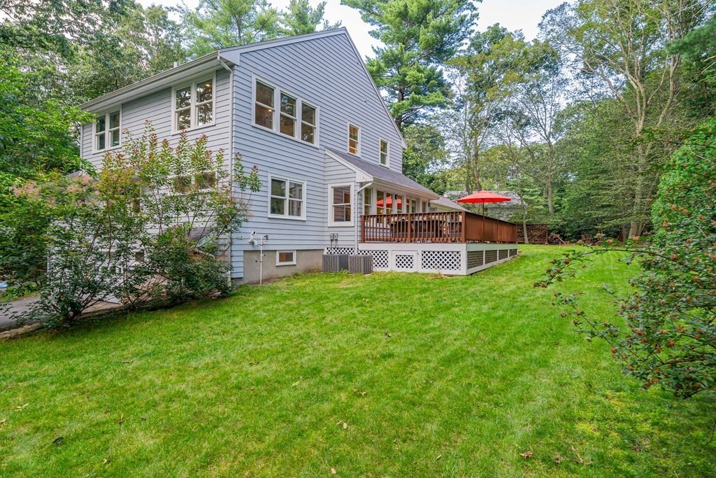 49 Baskin Road Lexington, MA 02421 - Photo 41 of 42 a view of a house with backyard and garden