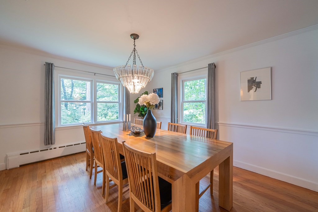 49 Baskin Road Lexington, MA 02421 - Photo 8 of 42 a view of a dining room with furniture window and wooden floor