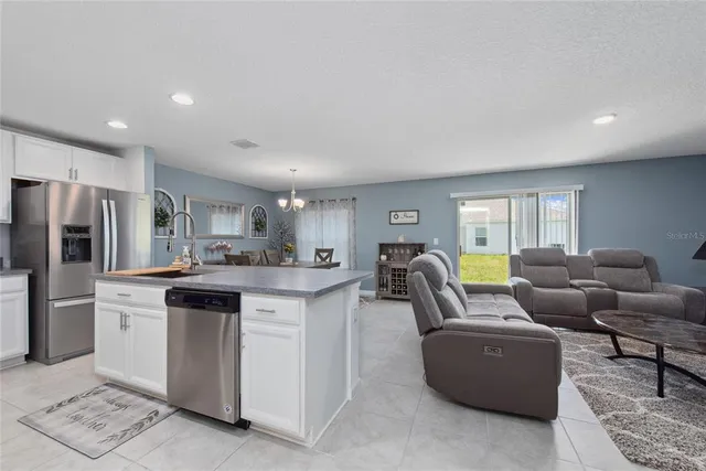 a bedroom with a bed and dresser