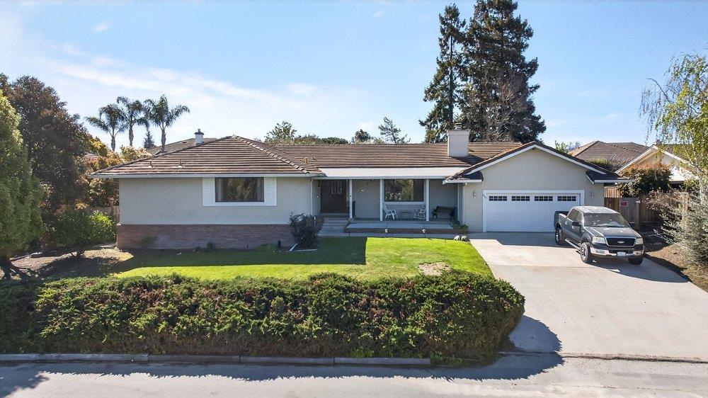 913 Ridgemark Drive Hollister, CA 95023 - Photo 49 of 75 a front view of a house with garden