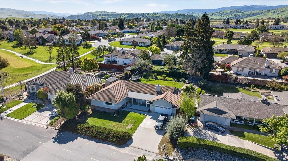 913 Ridgemark Drive Hollister, CA 95023 - Photo 54 of 75 an aerial view of a city with lots of residential buildings
