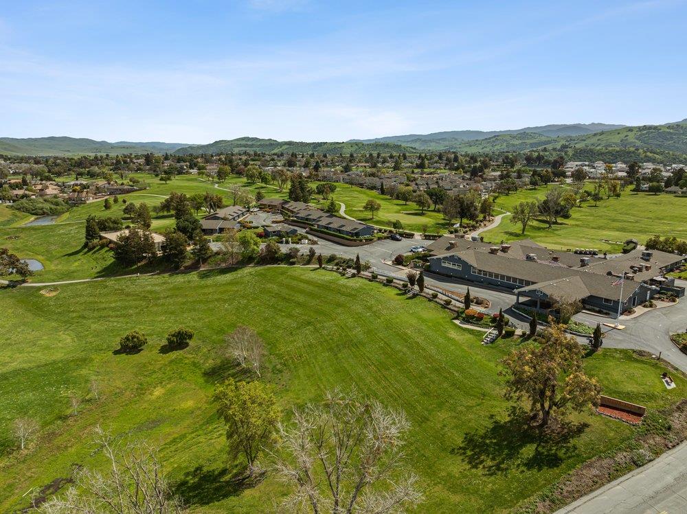 913 Ridgemark Drive Hollister, CA 95023 - Photo 64 of 75 an aerial view of residential houses with outdoor space and trees