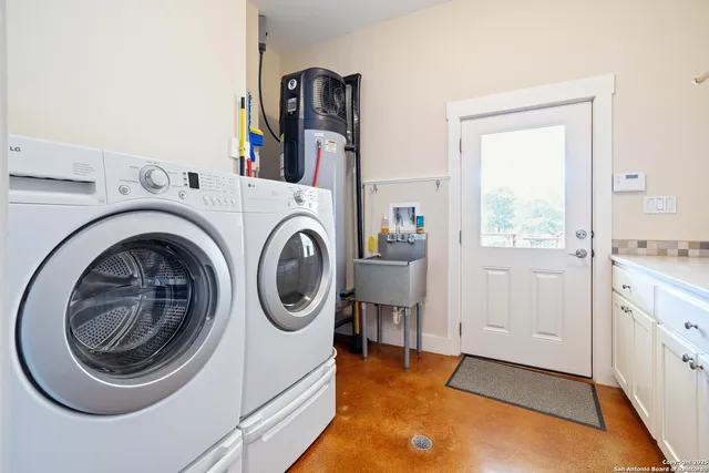 a utility room with dryer and washer