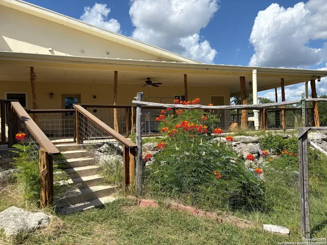 a view of a bathtub in a garden