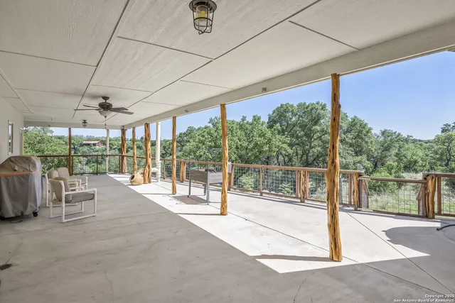 a view of a patio with a garden view