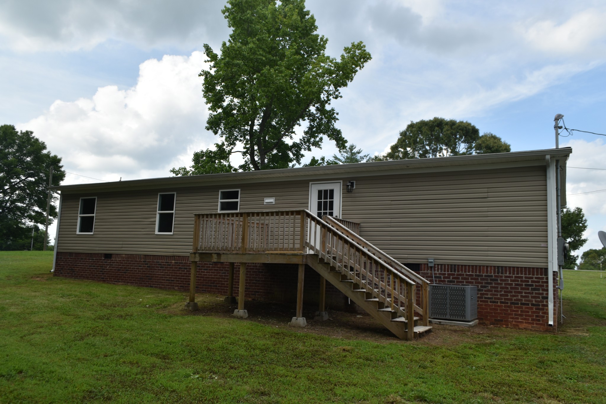 149 Harbin Road Fayetteville, TN 37334 - Photo 2 of 12 a view of a house with a yard