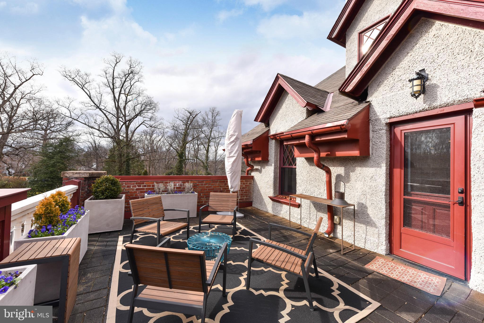 2829 Sacks Street, Unit SA506 Silver Spring, MD 20910 - Photo 12 of 34 a terrace of a house with outdoor seating