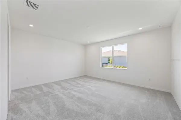 a view of a house with a swimming pool