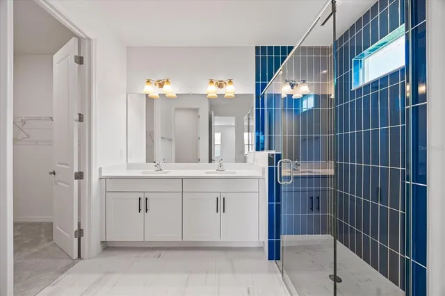 a house view with swimming pool and trees in the background